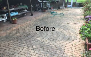 Dirty backyard bricks prior to professional cleaning in Washington State