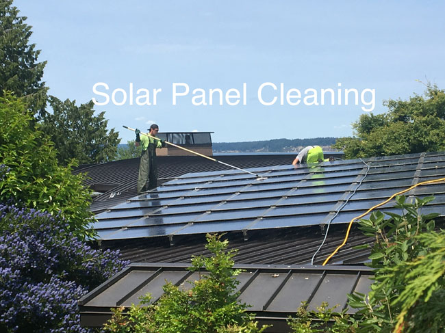 res-Hayden-and-Matt-cleaning-solar-panels Professional solar panel cleaners at work on a rooftop in WA